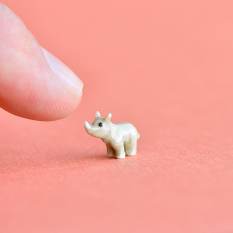 World's Tiniest Rhinoceros Figurine -  Camp Hollow