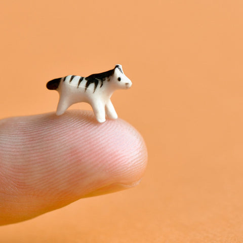 🎁 World's Tiniest Zebra Figurine (100% off)